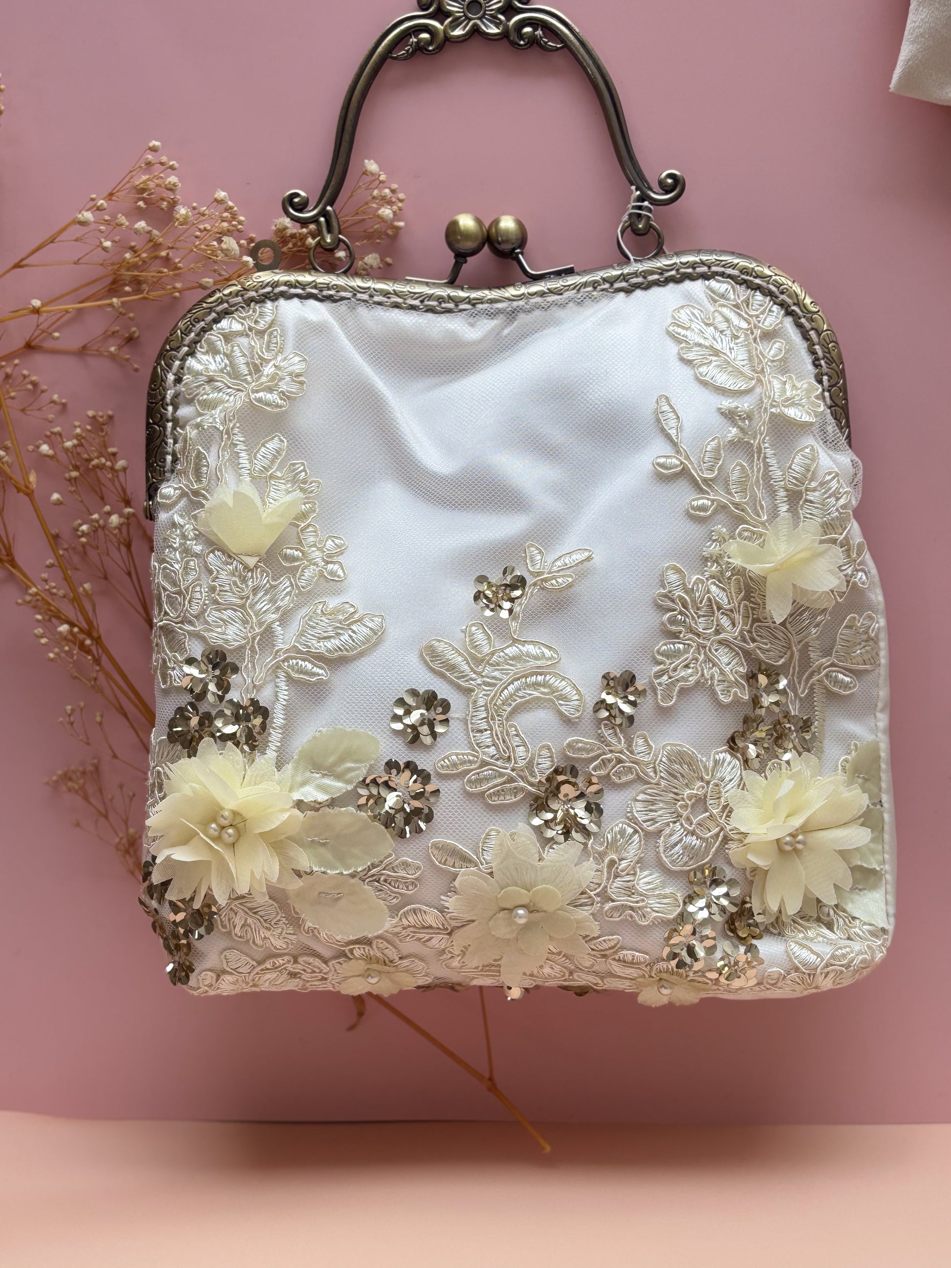 Bolsa de mano flores bordadas